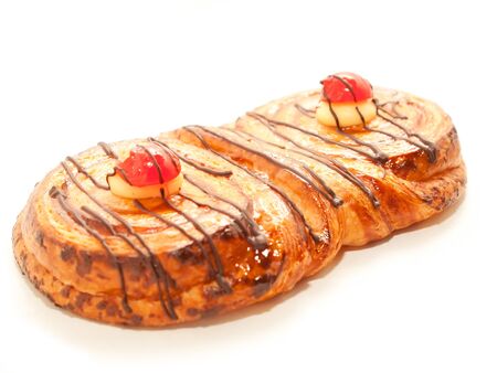 ButterÂ  bun with chocolate and cream isolated on whiteの写真素材