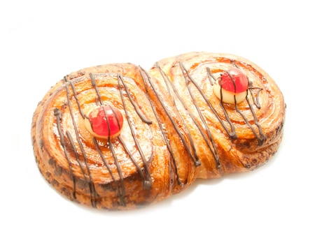 ButterÂ  bun with chocolate and cream isolated on whiteの写真素材