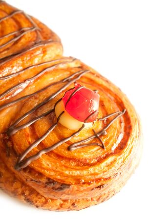 ButterÂ  bun with chocolate and cream isolated on whiteの写真素材