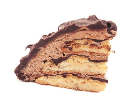 chocolate marzipan slice of cake isolated on white backgroundの写真素材