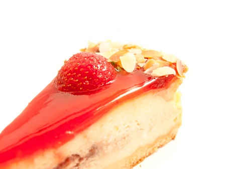 Cheesecake with strawberry isolated on white の写真素材