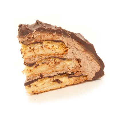 chocolate marzipan slice of cake isolated on white backgroundの写真素材