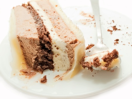 slice of chocolat mousse cake on white plateの写真素材