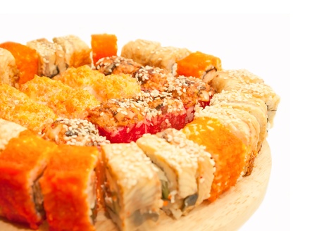  sushi rolls in range on the desk isolated on whiteの写真素材