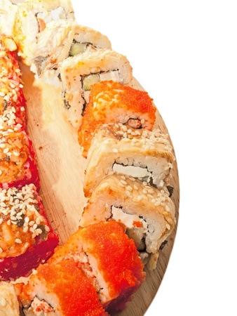  sushi rolls in range on the desk isolated on whiteの写真素材