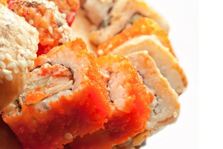 sushi rolls in range on the desk isolated on whiteの写真素材