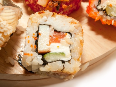 sushi roll with eel on the desk closeup isolated on whiteの写真素材