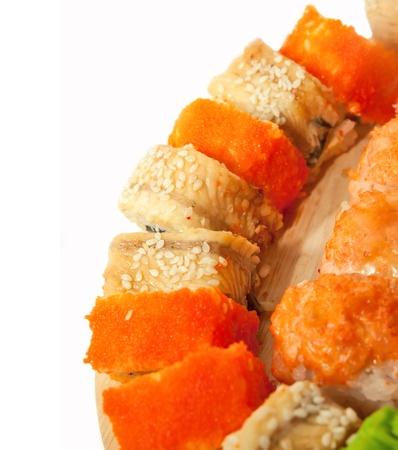  sushi rolls in range on the desk isolated on whiteの写真素材