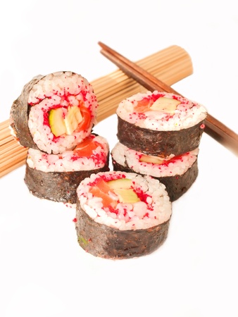  rolls with shrimp, salmon and red masago  and chopstick isolated on whiteの写真素材