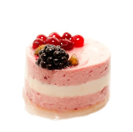 yogurt cranberries cake with berries isolated on whiteの写真素材