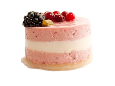 yogurt cranberries cake with berries isolated on whiteの写真素材