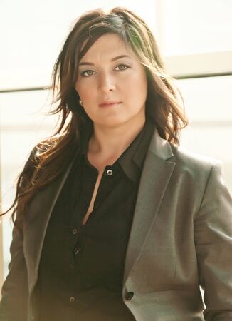 busineeslady in grey pantsuitの写真素材