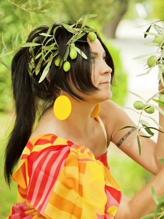 women in image of olive nymph. cloudy dayの写真素材
