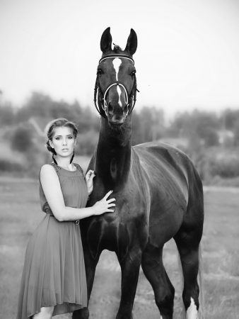 portrait of young girl  with  horseの写真素材