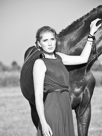 portrait of young girl  with  horseの写真素材