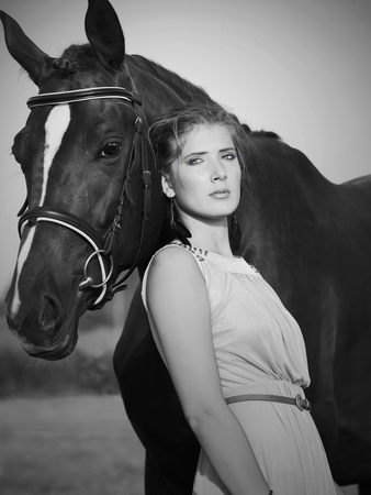 portrait of beautiful  girl  with  horseの写真素材