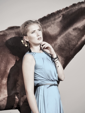 portrait of young girl  with  horseの写真素材