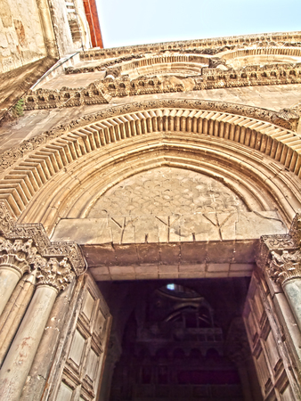 Main entrance to the Church of the Holy Sepulchre in old city of Jerusalemの写真素材