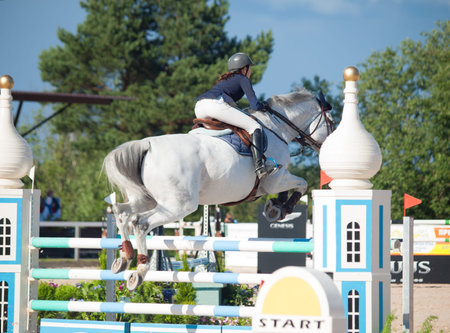SAINT PETERSBURG-JULY 05  Rider Aleksandra Pushkarskaya on Corinte  in the CSI3 -W CSIYH1 ...