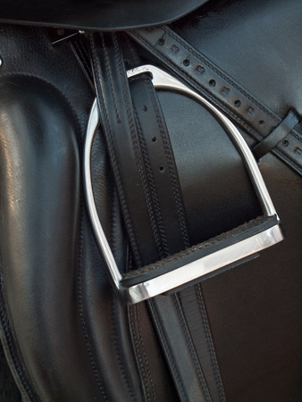 stirrup at dressage saddle. close upの写真素材