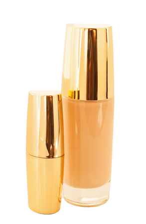luxury foundation and lipstick isolated on whiteの写真素材