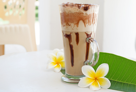 Frappe Iced Coffee Drink with plumeriaの写真素材