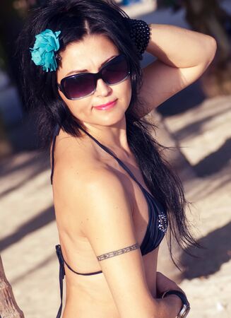 portrait of woman relaxing on beachの写真素材