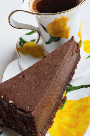 tasty a chocolate cheese cake with cup of coffeeの写真素材