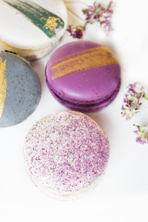 colorful macaroon cakes  against white backgroundの写真素材