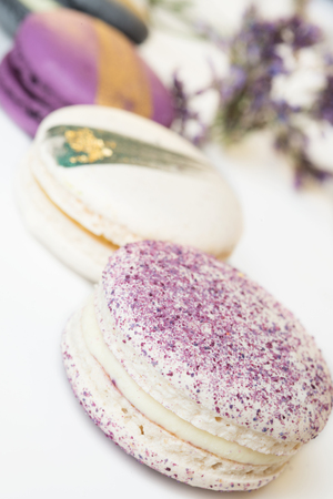 colorful macaroon cakes  against white backgroundの写真素材