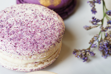 colorful macaroon cakes  against white backgroundの写真素材