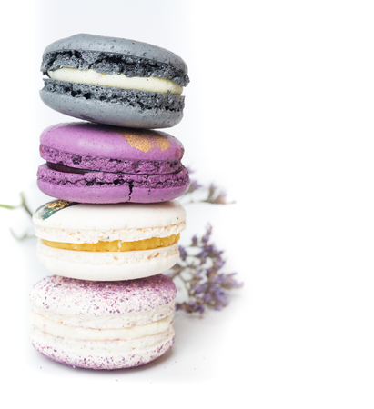 colorful macaroon cakes  against white backgroundの写真素材