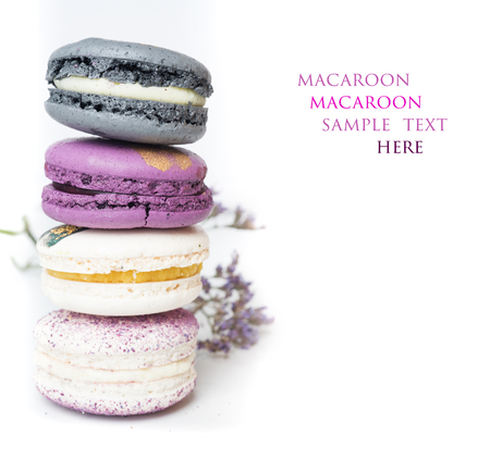 colorful macaroon cakes  against white backgroundの写真素材
