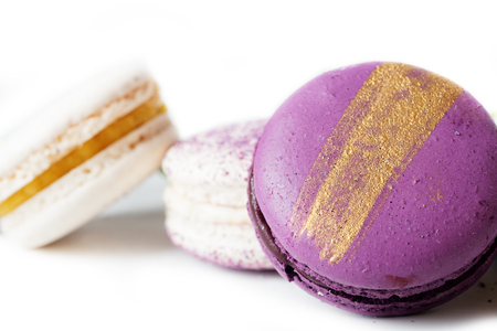 colorful macaroon cakes  against white backgroundの写真素材