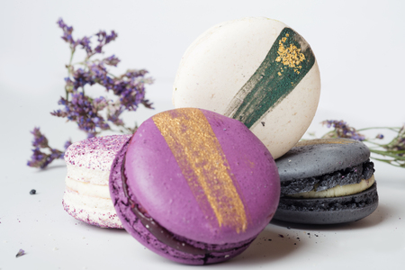 colorful macaroon cakes  against white backgroundの写真素材