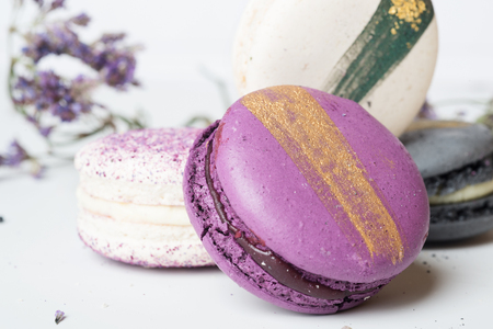 colorful macaroon cakes  against white backgroundの写真素材