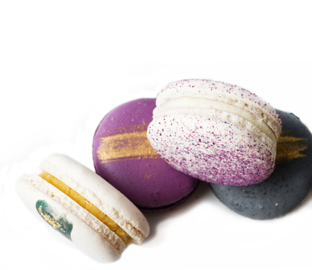 colorful macaroon cakes  against white backgroundの写真素材