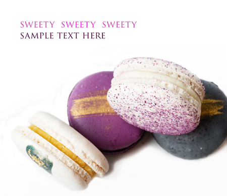 colorful macaroon cakes  against white backgroundの写真素材