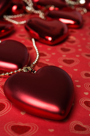 holiday decoration hearts  at red background. studioの写真素材
