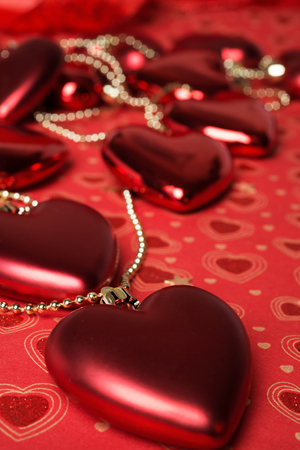 holiday decoration hearts  at red background. studioの写真素材