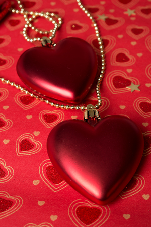 holiday decoration hearts  at red background. studioの写真素材