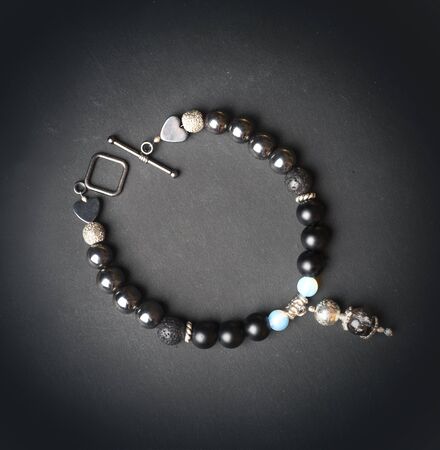 jewel handmade bracelet with semipreciouse stones at black backgroundの写真素材