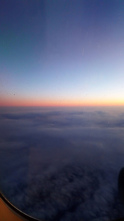 Cloudscape background from airplane. Sunsetの写真素材