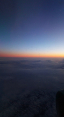  cloudscape background from airplane . sunsetの写真素材