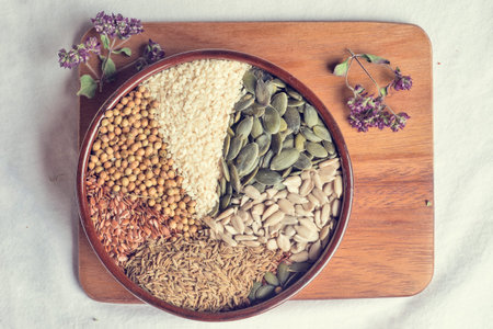 Spices and herbs in ceramic bowl. seasoning. Colorful natural additives.