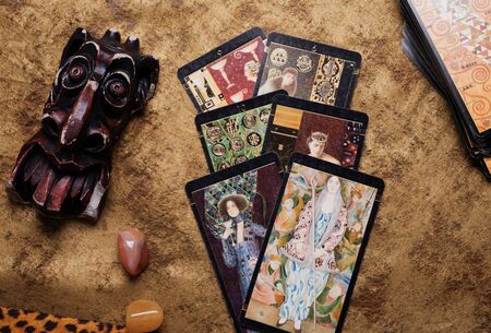 Spelling Tarot with devil figure. studio shotの写真素材