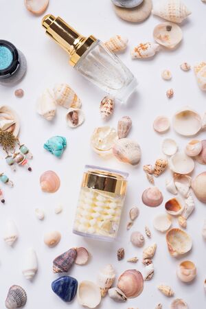 precious skin care cosmetics around  natural shells and gemstones. close upの写真素材