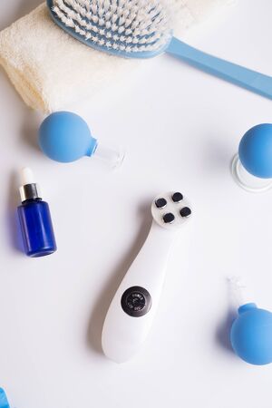  set for massage with  hardware equipment, vacuum jars and and massage brush.  anti-age and anti-cellulite set for home procedure.   beauty conseptの写真素材