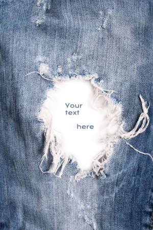 fashion jeans details - hole with free space. jeans background. studio shotの写真素材