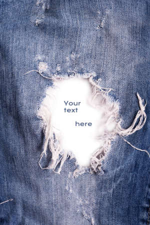 fashion jeans details - hole with free space. jeans background. studio shotの写真素材